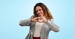 Business woman, heart hands and studio with smile, face and icon for love, care or review by blue background. Entrepreneur, sign language or emoji for thank you, support or kindness in portrait