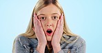 Face, wow and a woman with a gesture on a blue background for information or news. Surprise, studio and portrait of a young girl looking with shock after an announcement, crazy or advertising