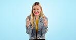 Thumbs up, hands and portrait of woman with support, motivation or thank you emoji on blue background in studio. Yes, happy and girl with success, agreement and smile in promotion or mockup space