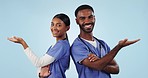 Face, showing and doctors with promotion, opportunity and announcement on a blue studio background. Portrait, man and woman with hand gesture, medical professionals and teamwork with presentation