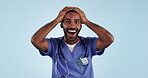 Wow, excited face and man with nurse achievement and excited about winning in a studio. Winner, blue background and male healthcare professional with smile, yes and portrait from promotion or bonus