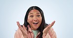 Wow, surprise and hands on face of woman in studio with news, notification or promo on blue background. Emoji, shock and portrait of Asian female model with omg reaction to gossip or announcement 