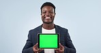 Happy black man, tablet and green screen in marketing or advertising against a studio background. Portrait of African businessman smile showing technology display, app or mockup with tracking markers