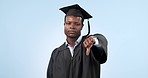 Review, face and black man or graduate with thumbs down for school experience. Negative, graduation and portrait of African student with a hand gesture for university feedback on a studio background