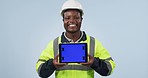 Architecture man, tablet green screen and industrial presentation of renovation, engineering or design in studio. Face of construction worker or african person on digital mockup and a blue background