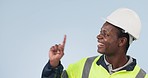 Thinking, idea and man engineer pointing at mock space for deal or announcement isolated a studio blue background. Construction, professional and worker planning project or safety inspection