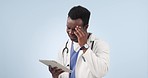 Doctor, headache and tablet technology with medical stress, virtual or video call in telehealth on a blue background. African worker in healthcare pain, fatigue and confused on digital chat in studio