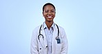 Happy, smile and face of woman doctor in studio with confidence for medical consultation. Pride, career and portrait of professional African female healthcare worker isolated by blue background.