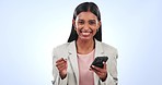 Happy business woman, phone and winning in success, good news or prize against a studio background. Excited female person smile in celebration for lottery, promotion or discount on mobile smartphone