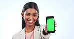 Business woman, phone and green screen in advertising or marketing against a studio background. Portrait of happy female person or employee smile showing mobile smartphone app display or mockup space