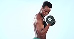 Fitness, dumbbell and black man training for muscle, health and bodybuilding isolated in a studio blue background. Shirtless, wellness and portrait of person exercise or workout for bicep strength