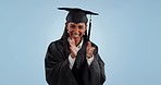 Happy woman, graduation and applause in celebration, winning or success against blue studio background. Portrait of excited female person, student or graduate clapping in congratulations on mockup