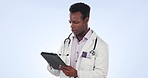 Tablet, doctor and black man in studio for medical service, care and online support for hospital. Healthcare, consulting and person on digital tech for website, research and help on blue background