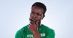 Studio face, black man and volunteer thinking of charity project, pollution support plan or eco friendly idea. Social responsibility, activist and problem solving climate change on blue background