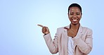 Business black woman, face and pointing to blue background space for consulting offer, deal and opportunity. Happy, portrait and consultant with studio sales mockup, choice and marketing promotion