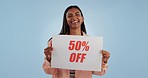 Happy woman, billboard and sale discount on price or shopping deal against a studio background. Portrait of female person smile with poster or sign for advertising, special off or retail marketing