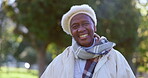 Senior woman, african and outside with smiling, laughing and warm in nature, enjoying and retired. Portrait, joking and elderly with happiness, funny and joyful in retirement, alone and fresh air