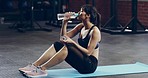 Staying hydrated during her workout