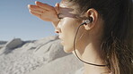 Fitness, headphones and woman start on a beach for running, workout and exercise. Music, freedom and athlete back by the Miami sea ready for health, wellness and training in the summer sun and sand