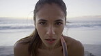 Running, tired and face of a woman at the beach for fitness, cardio training and body goal for summer in Brazil. Exercise, motivation and portrait of a girl breathing after a workout by the ocean