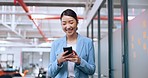 Asian woman, modern office and smartphone for connectivity, social media and fintech. Female entrepreneur, employee or lady with phone, communication and search internet with smile and online texting