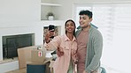 Couple, new home and video call for moving update, living room live streaming and talking of property or real estate. Happy interracial people or influencer in selfie with boxes in house or apartment