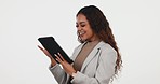 Tablet, laugh and young woman in a studio scroll on social media for comic, funny or comedy video. Happy, smile and female model from Colombia networking on digital technology by white background.