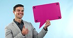 Business man, speech bubble and thumbs up for financial forum, communication and chat poster in studio. Face of corporate worker with FAQ mockup, quote and voice tracking marker on blue background