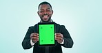 Business man, green screen and tablet mockup in studio for website, internet and blue background. Professional black male person with technology for tracking markers, ux advertising or app review