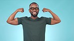 Fitness, smile and a black man kissing his bicep in studio on a blue background for strong muscles. Portrait, smile and arms with a happy young athlete flexing for motivation or training success