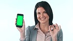 Okay, business woman and green screen of phone, space and agreement in studio on white background. Happy worker, portrait or yes emoji on mobile tracking markers for certified news, promotion or deal