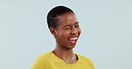 Face, wink and happy black woman in studio isolated on a white background mockup space. Portrait, flirt and African model blink in makeup, cosmetics and smile for facial expression of confidence.