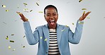 Confetti, celebration and black woman face with wow news in studio for business success on grey background. Glitter, announcement and portrait of female entrepreneur with startup, loan or success