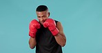 Man, boxer and fitness in martial arts, training or fighting practice against a studio background. Portrait of male person, athlete or fighter with boxing gloves for sports or self defense on mockup