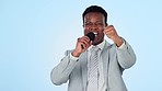 Black man, microphone and sport broadcast with cheers, excited journalist with success and fist pump on blue background. Game show commentator, hosting celebration and winner in media in studio