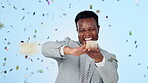 Money rain, success or happy black man in studio for jackpot, competition giveaway or cash prize. Confetti, throw or rich African businessman excited by lottery or gambling win on blue background
