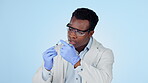 Science, man and syringe in studio for vaccine, medical research, medicine solution or container with shot. Injection, scientist or black person for healthcare analytics on blue background or mock up