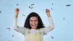 Woman, confetti or celebrate win announcement, excited surprise on blue studio background. Female person, face or competition cheers wow achievement opportunity, reward notification or yes fist party