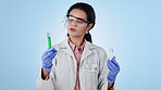 Chemistry, woman and researcher with vaccine, experiment and options on a blue studio background. Doctor, medical professional or scientist with vials, test tube or choice with healthcare or wellness