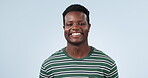 Happy, face and a black man on a studio background while laughing for a joke, meme or expression. Smile, portrait and a headshot of a young African person or model with confidence and fashion