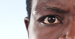 Black man, eye and confused in doubt, questions and shock on a blue studio background. Face, closeup and thinking with frown, problem and planning for why, ask and solution in portrait, zoom or idea