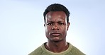 Black man, confused and angry face closeup with doubt, problem solving and why question in studio. Portrait, upset and frown with a African male person with what, planning and blue background