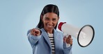 Pointing, recruitment and face of a woman with a megaphone for communication or announcement. Excited, motivation and portrait of an hr employee with a speaker for hiring on a studio background