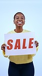 African woman, sale poster and studio with smile on face, presentation or excited by blue background. Girl, discount and promotion with commercial sign, banner and happy in portrait for shopping deal