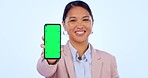 Green screen, phone and business Asian woman in studio for website, internet and social media. Corporate worker, advertising and portrait of person on smartphone with mockup space on blue background