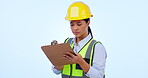 Woman, inspector and checklist to write in studio, maintenance and inspection in safety gear . Asian person, engineer and architect in industry, plan and documents for architecture goal in mockup