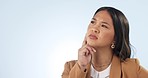 Thinking, doubt and young woman in studio with unsure, brainstorming or planning facial expression. Idea, reflection and Asian female model with dreaming face isolated by white background with mockup