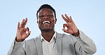 Face, perfect or happy black man in studio isolated on blue background for feedback or business review. Portrait, okay or person with like gesture, agreement or yes sign for discount or promo offer