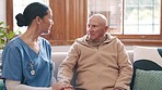 Healthcare, discussion and doctor with senior man in living room for diagnosis or treatment plan. Conversation, medical and female caregiver explaining medicare to elderly patient in nursing home.