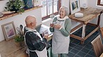 Coffee, conversation and senior couple in kitchen for communication, talking and bonding together. Happy, discussion and top view of elderly man and woman in retirement drinking cappuccino at home.